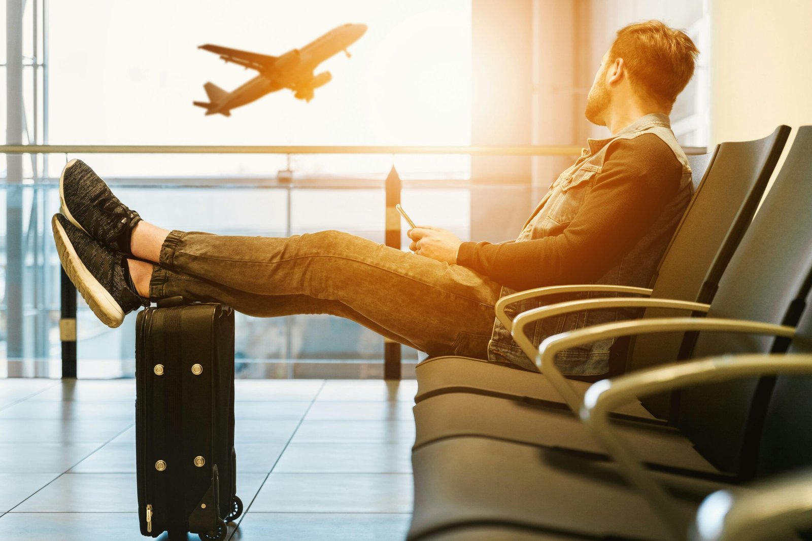 Working holiday traveller at an airport